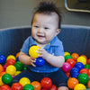 Baby in ball pit